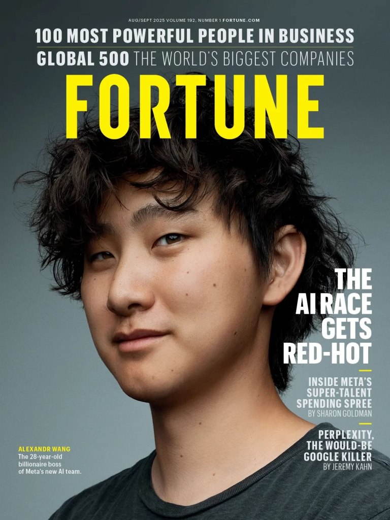 Close-up portrait of a young Asian man with dark hair, wearing a black shirt, featured on the cover of Fortune magazine's August/September 2025 issue, highlighting the 100 most powerful people in business.